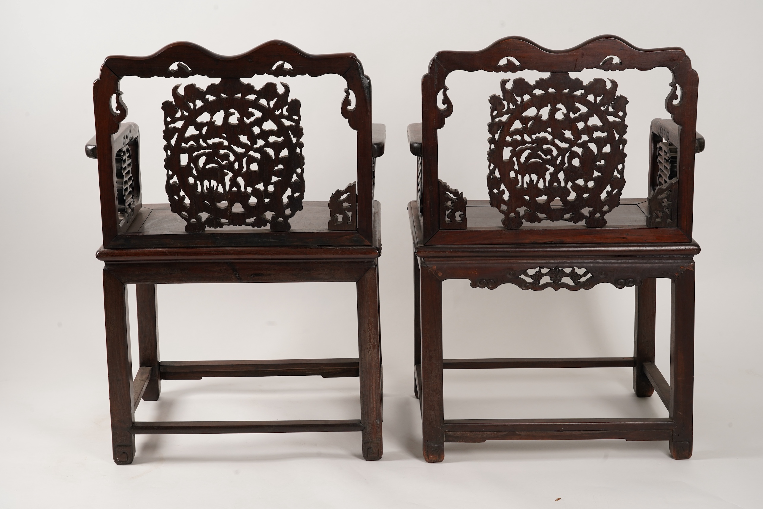 A pair of Chinese hongmu armchairs, late 19th century
